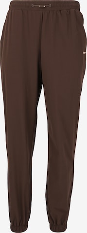 Athlecia Workout Pants 'Hero' in Brown: front