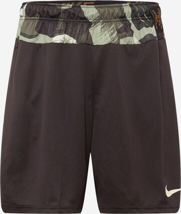 Pantalon de sport NIKE en marron : devant