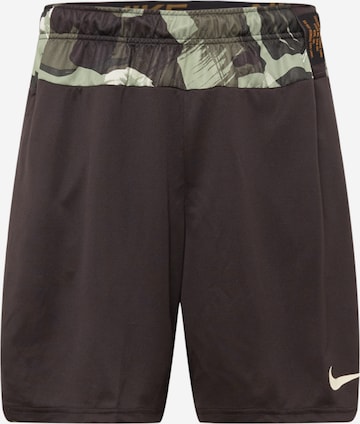 NIKE Workout Pants in Brown: front