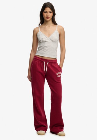 Bootcut Pantalon 'Athletic Essentials' Superdry & Co en rouge