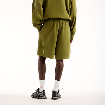 new balance Loosefit Shorts 'Trackside' in Grün