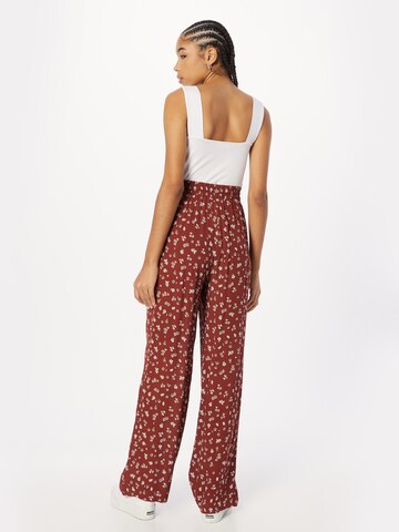 ABOUT YOU Loose fit Trousers 'Letizia' in Brown