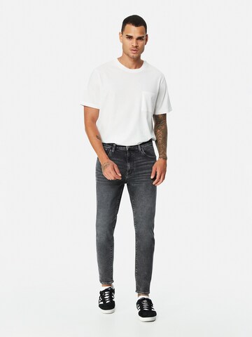 Mavi Tapered Jeans in Schwarz