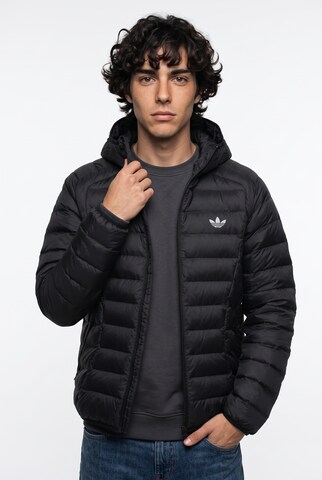 ADIDAS ORIGINALS Between-season jacket in Black: front