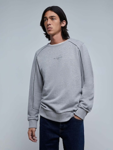 Sweat-shirt 'Welt' Scalpers en gris : devant