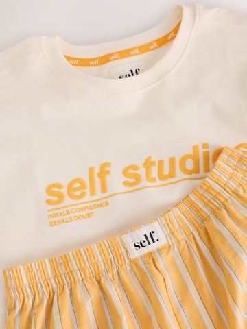 self. Korte pyjama in Oranje