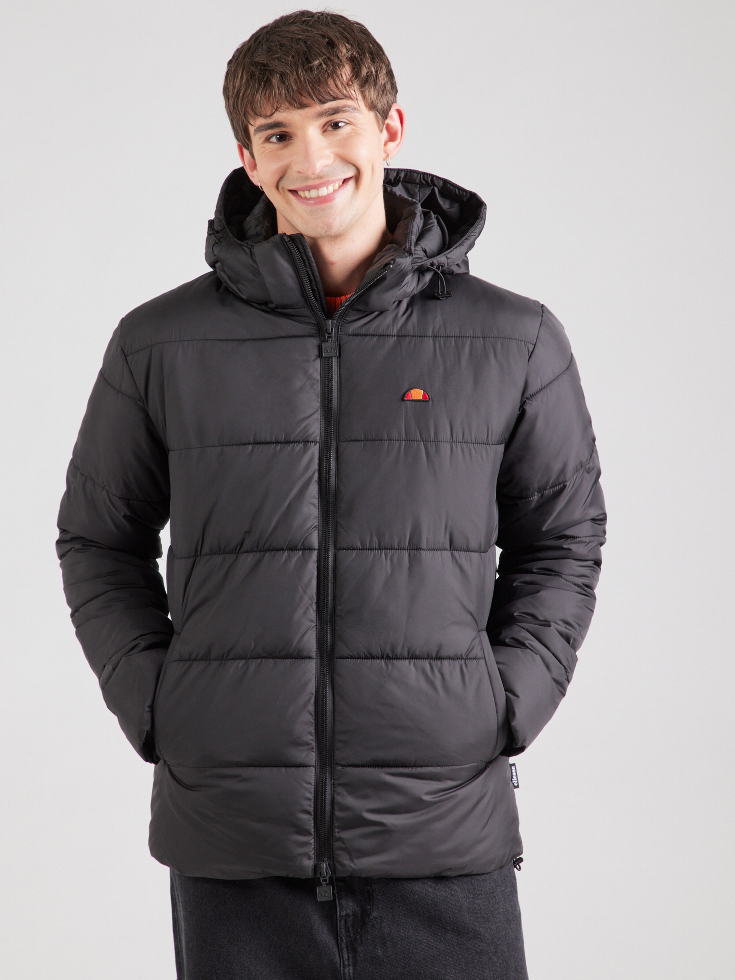 ELLESSE Winter Jacket 'Paddero' in Black | ABOUT YOU