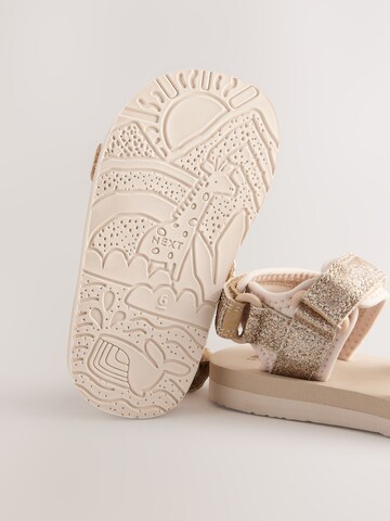 Next - Sandalias en oro