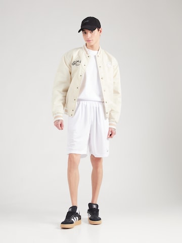 Karl Kani - Loosefit Pantalón en blanco