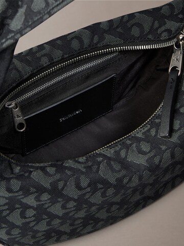Sac bandoulière Calvin Klein Jeans en noir