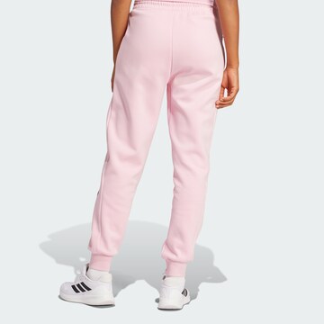ADIDAS SPORTSWEAR - Tapered Calças de desporto 'Z.N.E.' em rosa