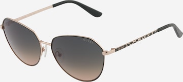 Ochelari de soare de la GUESS pe verde: față