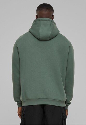 Sweat-shirt Karl Kani en vert