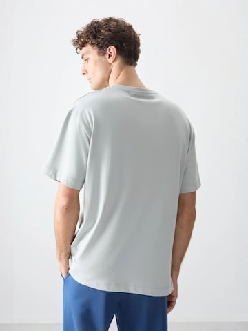 Tommy Life - Camisa 'T-Shirts' em cinzento