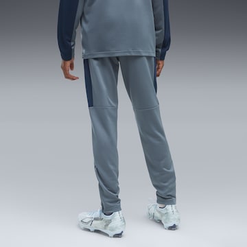 PUMA Slimfit Sportbroek in Blauw