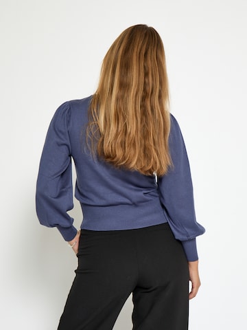 Top 'Liv' di minus in blu