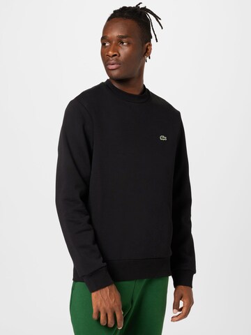 LACOSTE Sweatshirt in Black: front