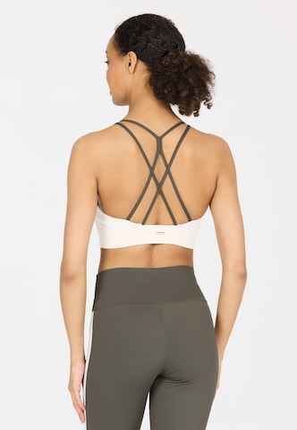 Athlecia Low Support Sports bra 'Aspasia' in Brown