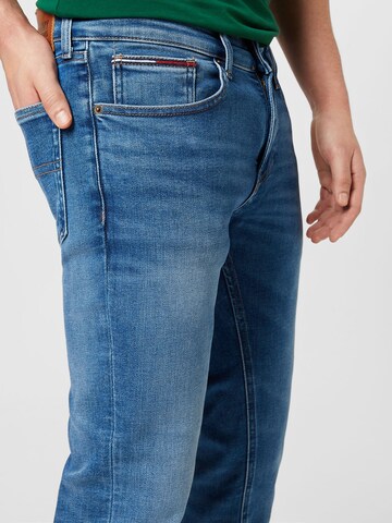 Tommy Jeans نحيف جينز 'Scanton' بلون أزرق