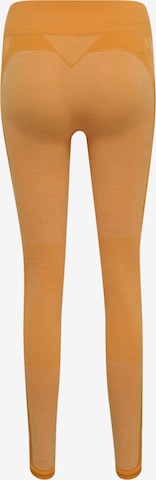 Skinny Pantaloni sportivi di Hummel in arancione