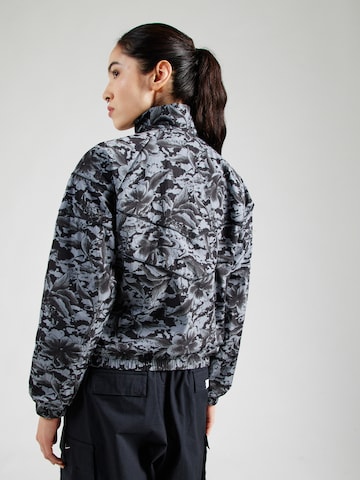 Geacă de primăvară-toamnă de la Nike Sportswear pe negru