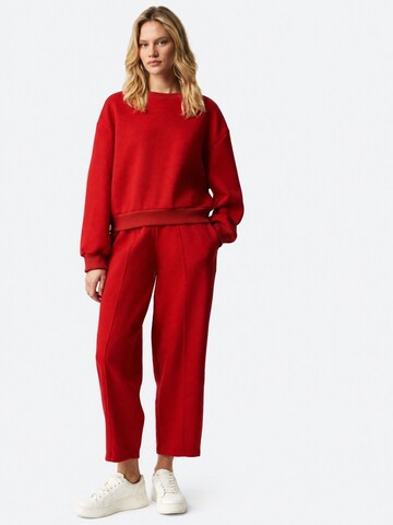 Pantalon 'Jogginghose' Ethiquet en rouge