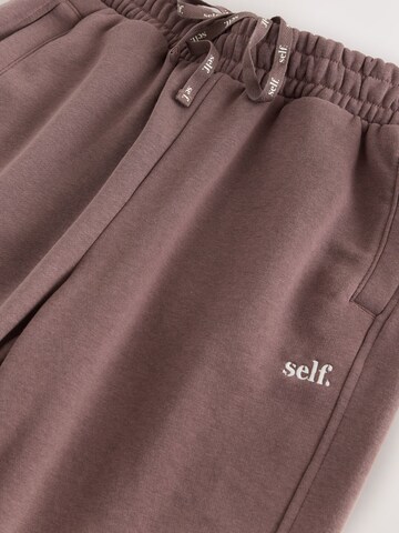 Next Tapered Hose in Braun