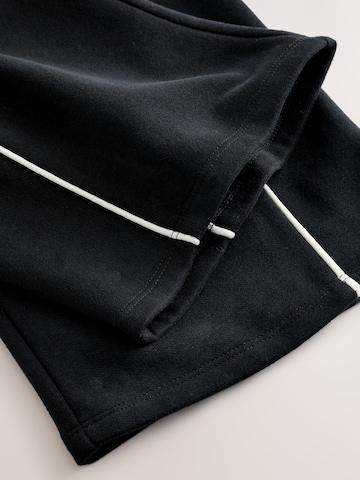 Wide leg Pantaloni sport de la Next pe negru