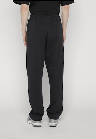 ROCAWEAR Regular Trousers 'Moola' in Black