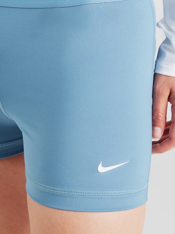 NIKE Skinny Športne hlače | modra barva
