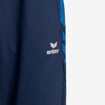 ERIMA Slim fit Workout Pants 'Six Wings' in Blue