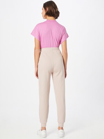 Tapered Pantaloni di TOMMY HILFIGER in rosa