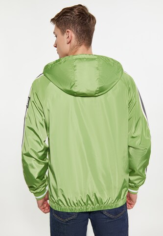 urban rain by Schmuddelwedda Between-Season Jacket in Green