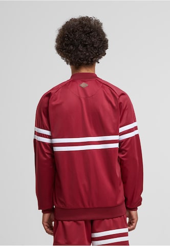 Unfair Athletics Between-season jacket in Red
