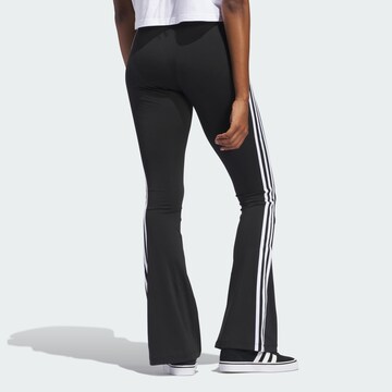 Evazați Leggings de la ADIDAS ORIGINALS pe negru