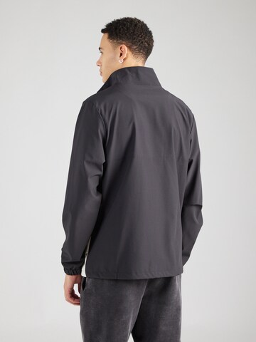 ELLESSE Between-Season Jacket 'Loselli' in Black