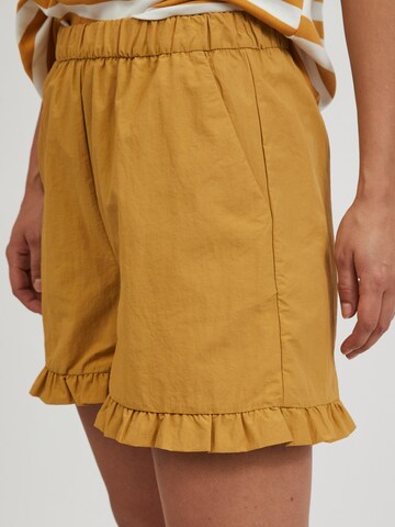 VILA tavaline Püksid 'Flounce', värv kollane