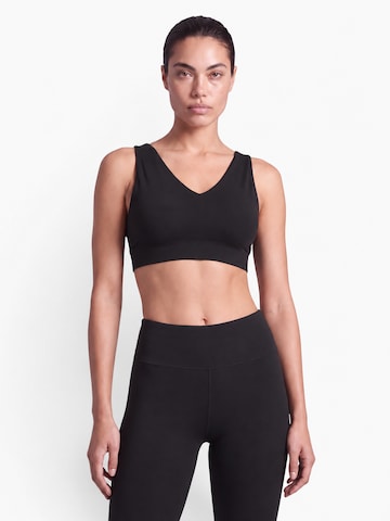 V!BE STUD!OS Bustier Urheilurintaliivit värissä musta: etupuoli