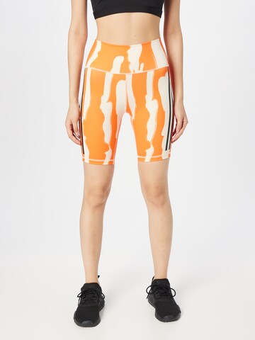 Skinny Pantalon de sport 'Thebe Magugu Bike' ADIDAS SPORTSWEAR en orange : devant