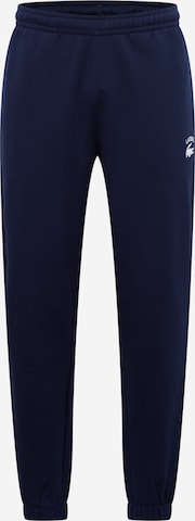 LACOSTE - Tapered Calças em azul: frente