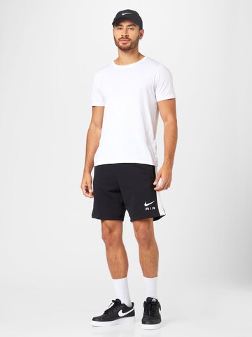 Regular Pantaloni 'AIR' de la Nike Sportswear pe negru
