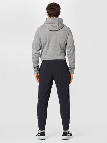 NIKE Tapered Sportsbukser i sort