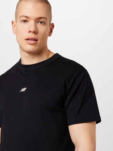 new balance T-Shirt in Schwarz