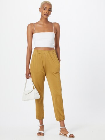 Effilé Pantalon 'Glowy' Karo Kauer en jaune