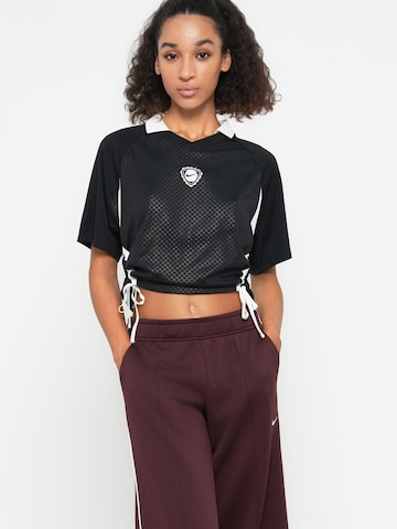 Nike Sportswear Zvonové kalhoty Kalhoty – červená