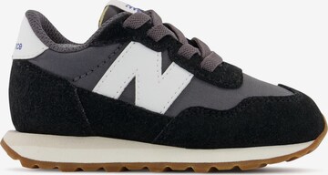 new balance Sneaker 237 in Schwarz