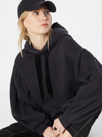 LEVI'S ® Sweatshirt 'Akane Rusched Hoodie' i sort