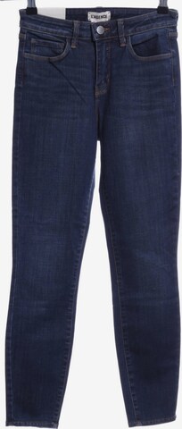 L' Agence Skinny Jeans in 22-23 in Blue: front