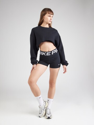 NIKE Skinny Sports trousers in Black