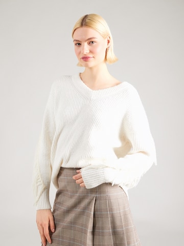 Pulover de la Abercrombie & Fitch pe bej: față